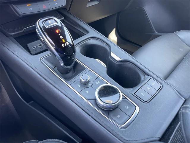Photo of 2024 Midnight Sky Metallic Cadillac XT4