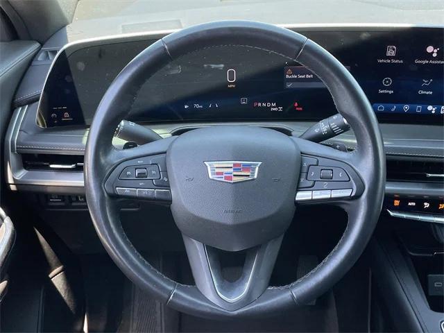 Photo of 2024 Midnight Sky Metallic Cadillac XT4