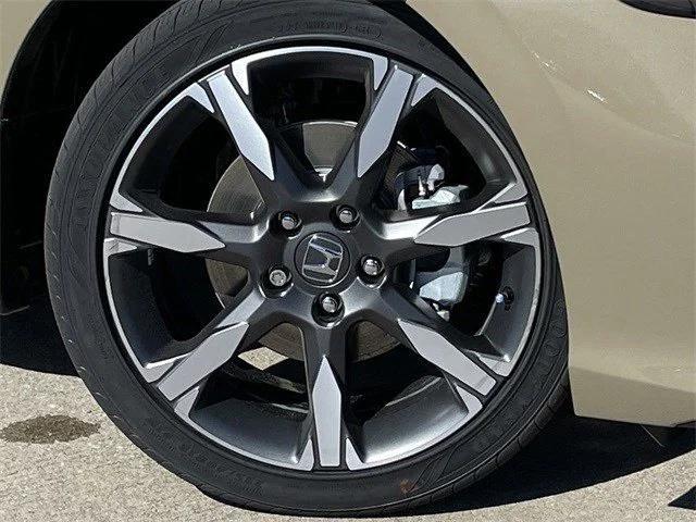 Photo of 2025 Sand Dune Pearl Honda Civic Hybrid