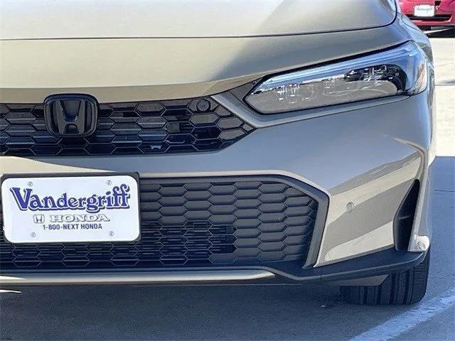 Photo of 2025 Sand Dune Pearl Honda Civic Hybrid