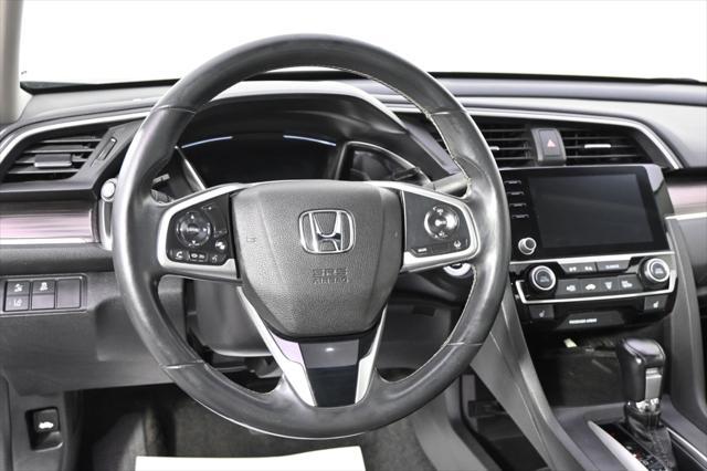 Photo of 2020 Cosmic Blue Metallic Honda Civic