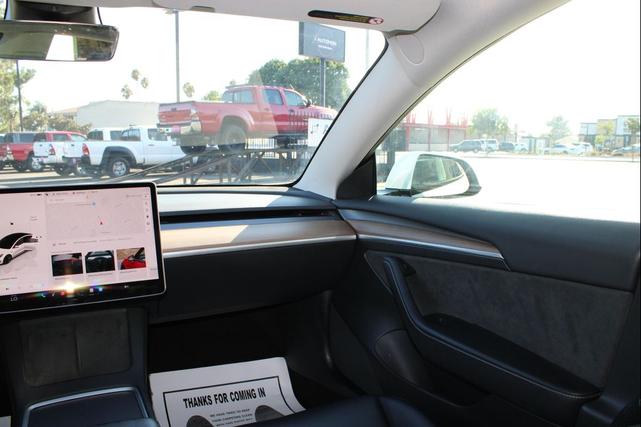 Photo of 2023 Pearl White Multi-Coat Tesla Model 3