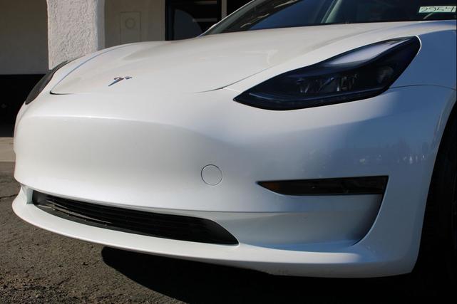 Photo of 2023 Pearl White Multi-Coat Tesla Model 3
