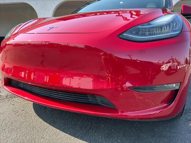 Photo of 2022 Red Multi-Coat Tesla Model Y