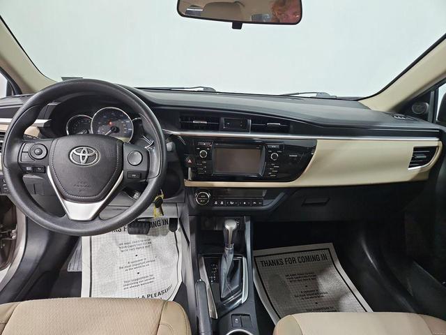 Photo of 2014 Classic Silver Metallic Toyota Corolla