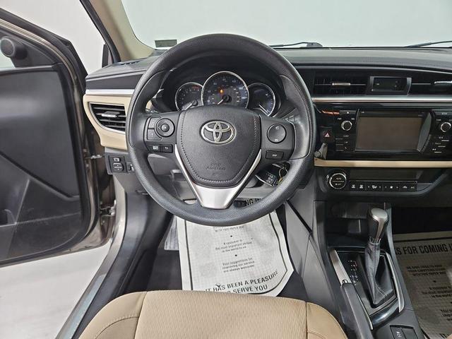Photo of 2014 Classic Silver Metallic Toyota Corolla