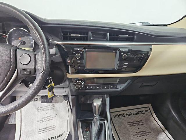 Photo of 2014 Classic Silver Metallic Toyota Corolla