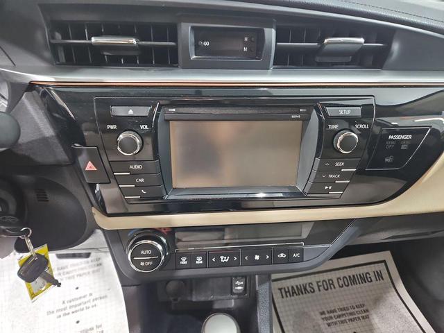 Photo of 2014 Classic Silver Metallic Toyota Corolla