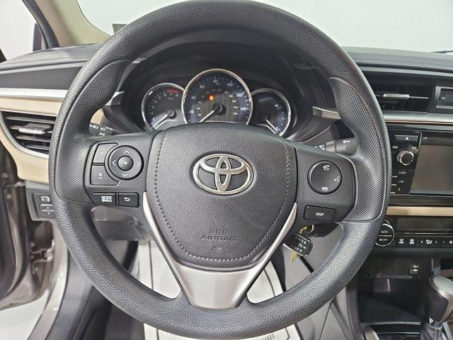 Photo of 2014 Classic Silver Metallic Toyota Corolla
