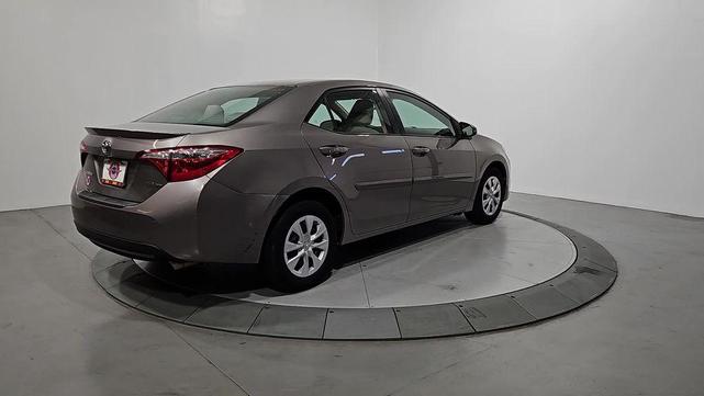 Photo of 2014 Classic Silver Metallic Toyota Corolla