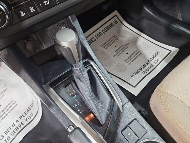 Photo of 2014 Classic Silver Metallic Toyota Corolla