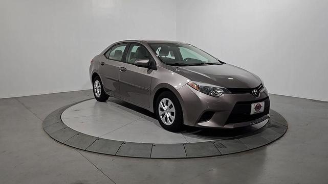 Photo of 2014 Classic Silver Metallic Toyota Corolla