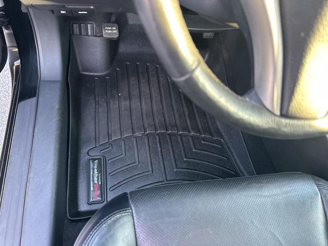 Photo of 2015 Super Black Clearcoat Nissan Altima