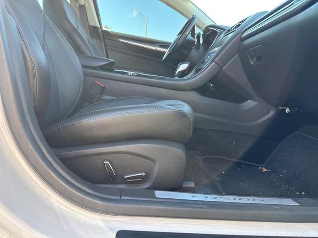 Photo of 2013 White Platinum Clearcoat Metallic Ford Fusion Hybrid