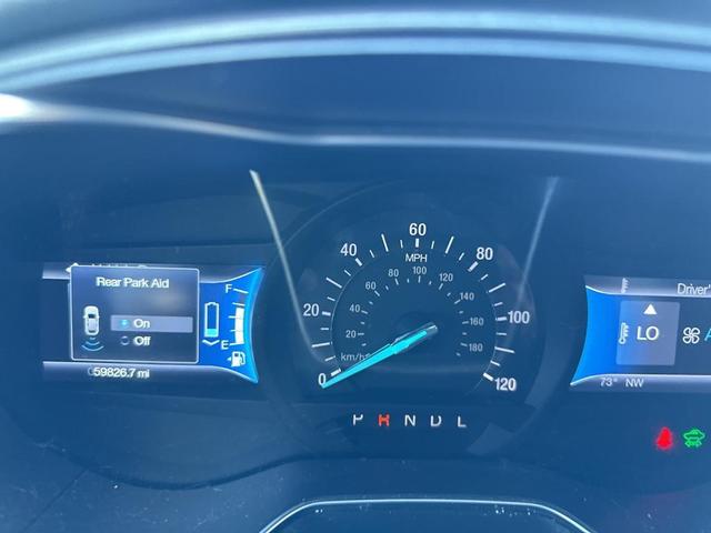 Photo of 2013 White Platinum Clearcoat Metallic Ford Fusion Hybrid