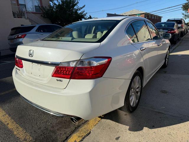 Photo of 2014 White Orchid Pearl Honda Accord
