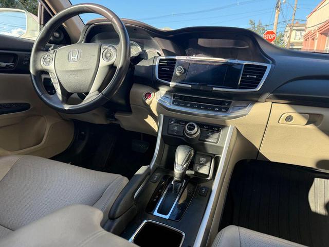 Photo of 2014 White Orchid Pearl Honda Accord