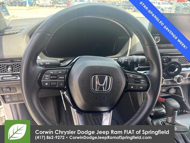 Photo of 2024 Platinum White Pearl Honda Civic