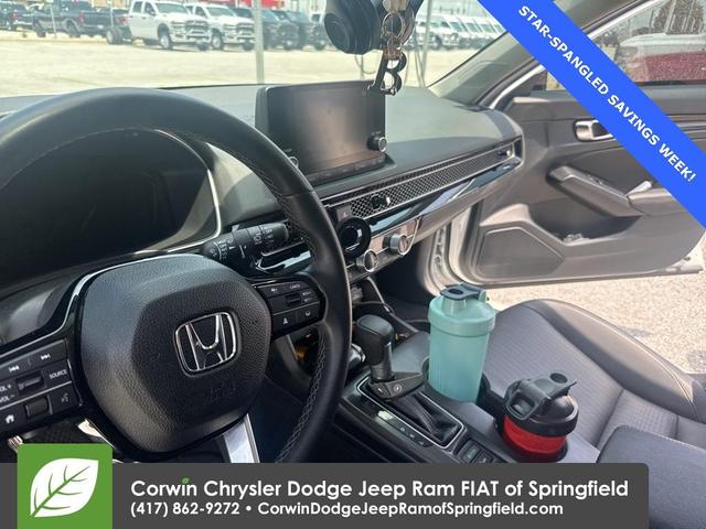 Photo of 2024 Platinum White Pearl Honda Civic