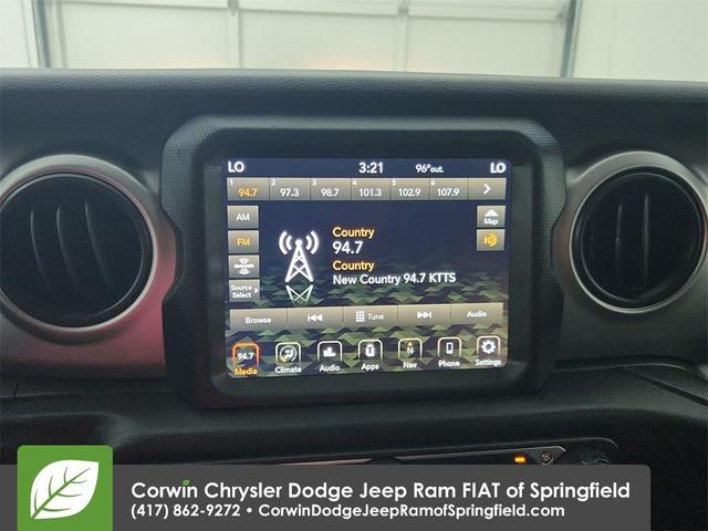 Photo of 2021 Snazzberry Pearlcoat Jeep Wrangler