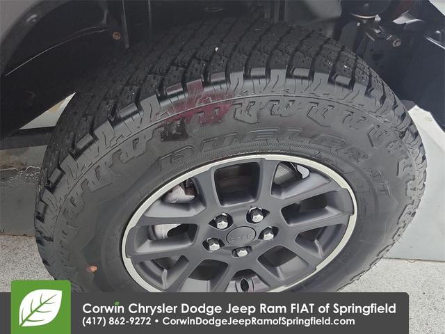 Photo of 2021 Snazzberry Pearlcoat Jeep Wrangler