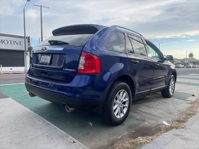 Photo of 2014 Deep Impact Blue Metallic Ford Edge