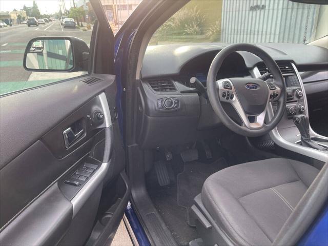 Photo of 2014 Deep Impact Blue Metallic Ford Edge