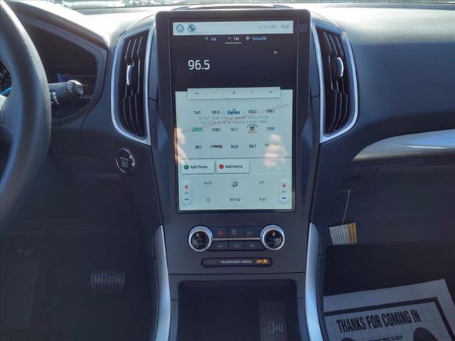Photo of 2024 Atlas Blue Ford Edge