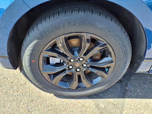 Photo of 2024 Atlas Blue Ford Edge