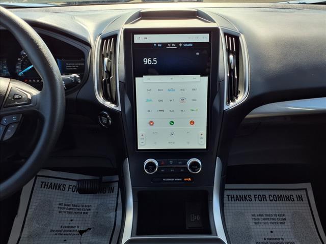 Photo of 2024 Atlas Blue Ford Edge