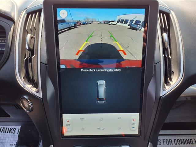 Photo of 2024 Atlas Blue Ford Edge