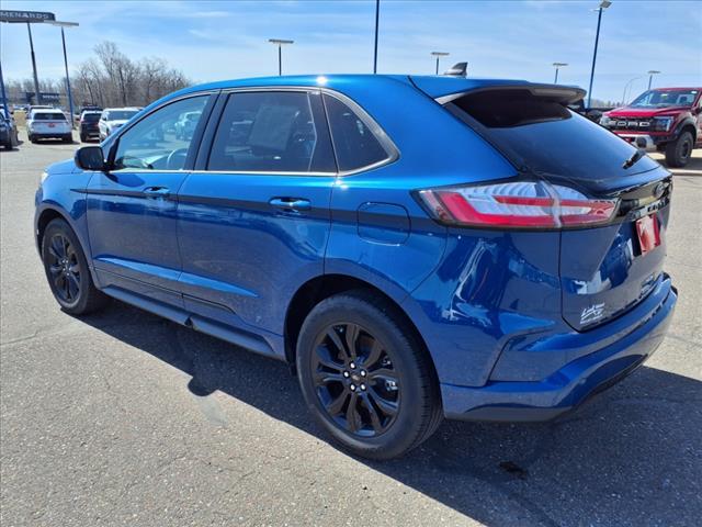 Photo of 2024 Atlas Blue Ford Edge