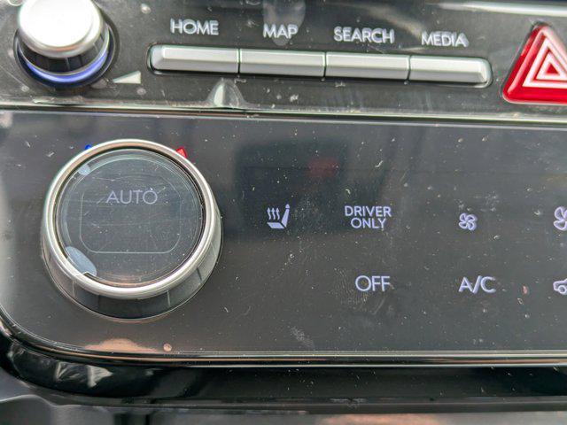 Photo of 2025 Ultimate Red Hyundai TUCSON Hybrid