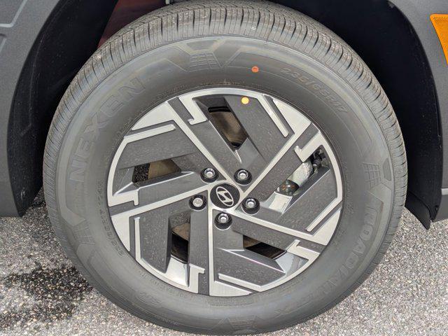 Photo of 2025 Ultimate Red Hyundai TUCSON Hybrid