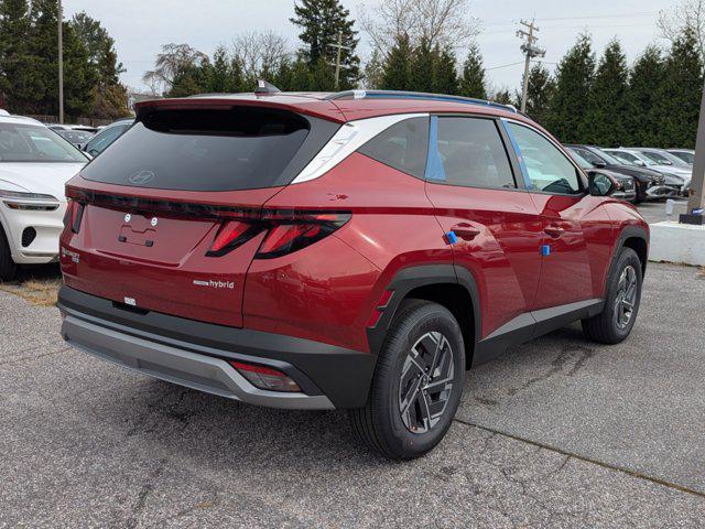 Photo of 2025 Ultimate Red Hyundai TUCSON Hybrid