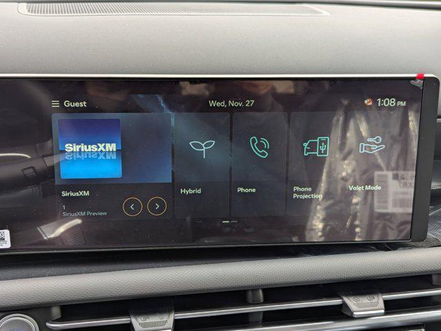 Photo of 2025 Ultimate Red Hyundai TUCSON Hybrid