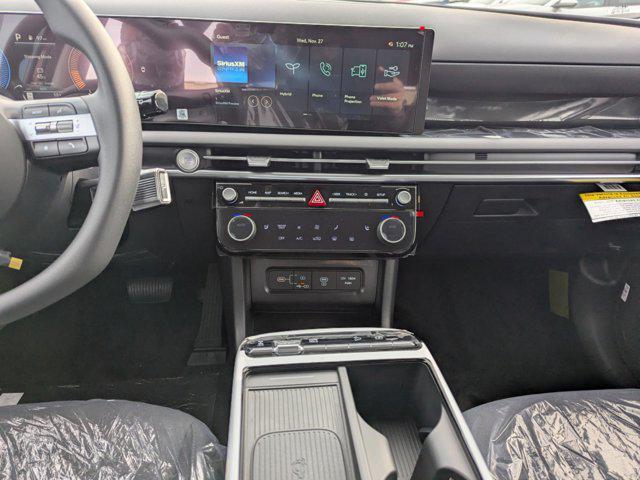 Photo of 2025 Ultimate Red Hyundai TUCSON Hybrid