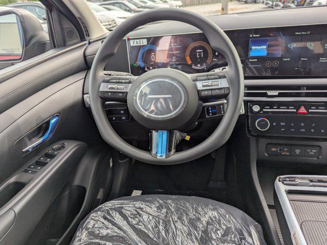 Photo of 2025 Ultimate Red Hyundai TUCSON Hybrid
