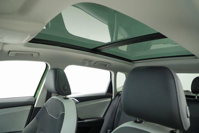 Photo of 2025 Moss Green Volkswagen Taos