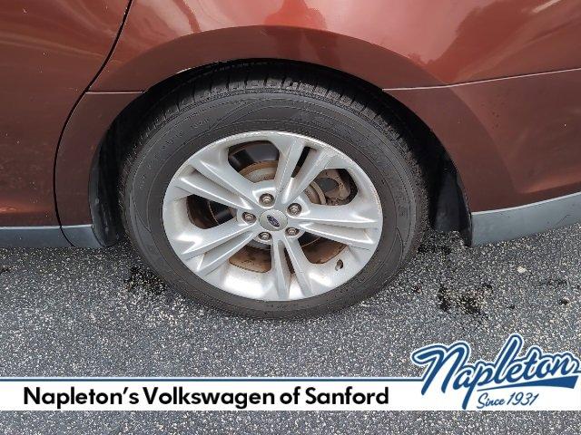 Photo of 2015 Bronze Fire Metallic Tinted Clearcoat Ford Taurus
