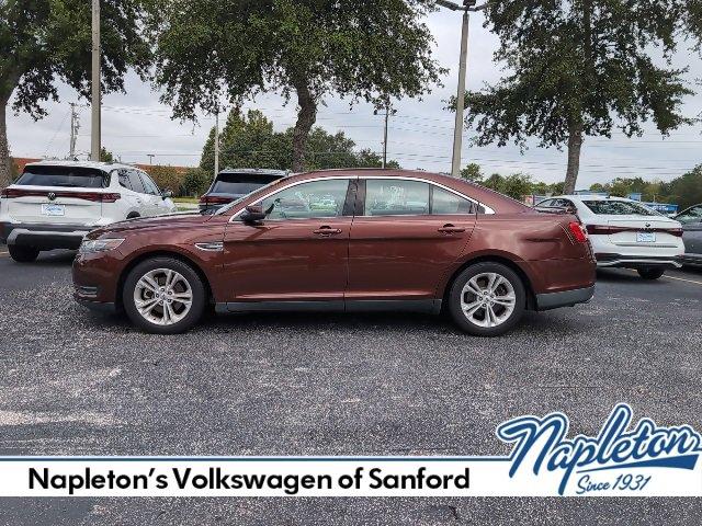 Photo of 2015 Bronze Fire Metallic Tinted Clearcoat Ford Taurus
