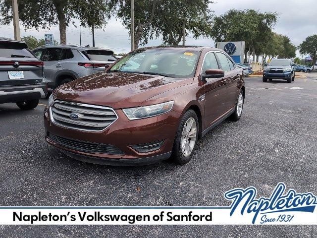 Photo of 2015 Bronze Fire Metallic Tinted Clearcoat Ford Taurus