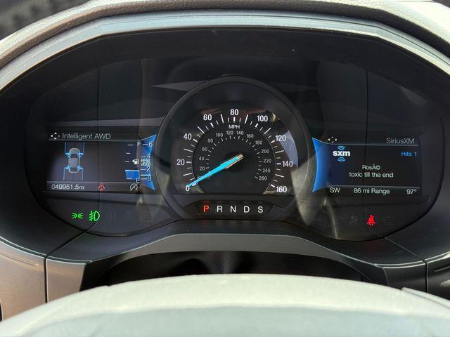 Photo of 2022 Agate Black Metallic Ford Edge