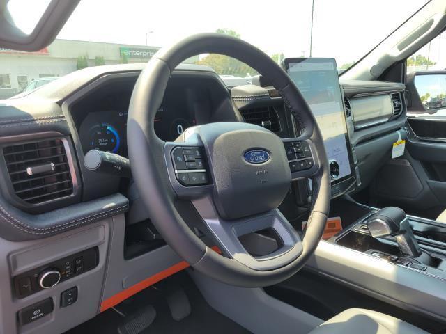 Photo of 2025 Rapid Red Metallic Tinted Clearcoat Ford F-150 Lightning