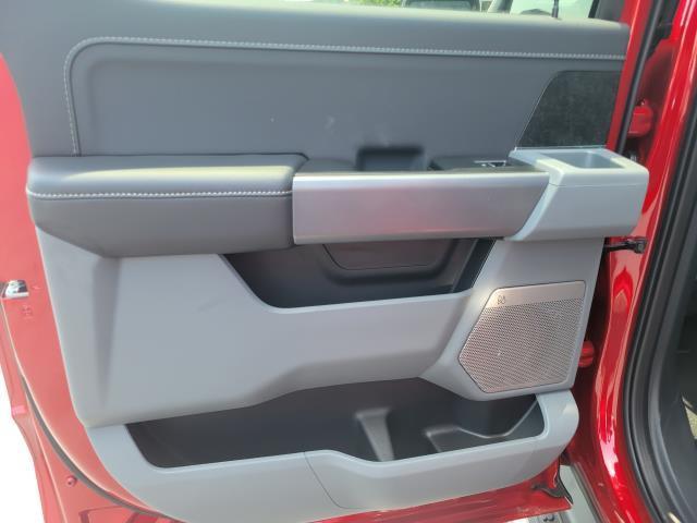 Photo of 2025 Rapid Red Metallic Tinted Clearcoat Ford F-150 Lightning