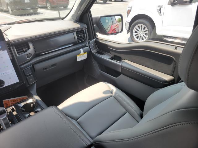 Photo of 2025 Rapid Red Metallic Tinted Clearcoat Ford F-150 Lightning
