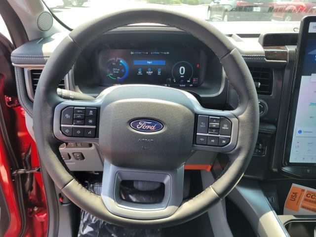 Photo of 2025 Rapid Red Metallic Tinted Clearcoat Ford F-150 Lightning