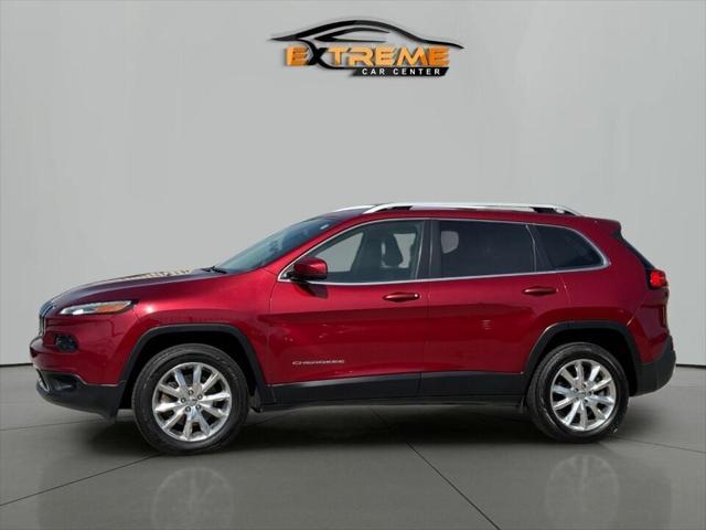 Photo of 2016 Deep Cherry Red Crystal Pearlcoat Jeep Cherokee