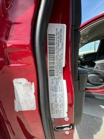 Photo of 2016 Deep Cherry Red Crystal Pearlcoat Jeep Cherokee