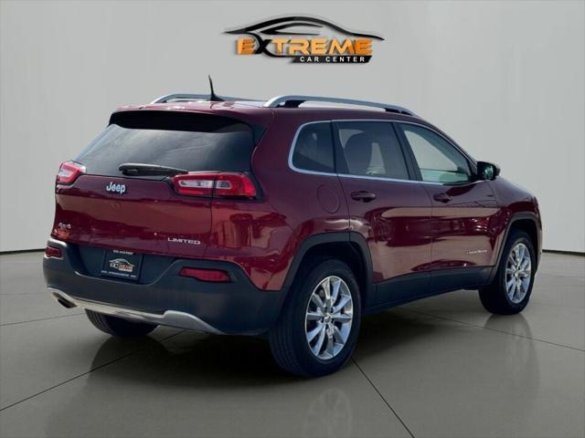Photo of 2016 Deep Cherry Red Crystal Pearlcoat Jeep Cherokee
